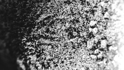 Close up of frost pattern. Colored Ice crystals or cold winter background.