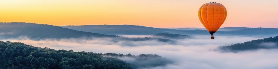 Hot air balloon adventure over foggy mountains at sunrise breathtaking nature journey
