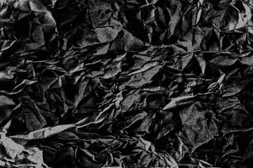 black crumpled paper background texture