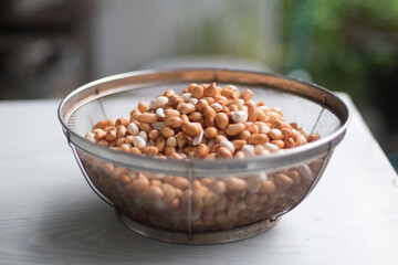 After soaked and cleaned peanuts (groundnut, goober pea, pindar, or monkey nut) in basket isolate...