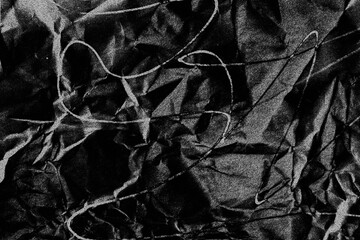 black crumpled paper background texture