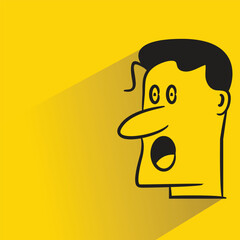 amazed man with shadow on yellow background