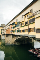 Florence, Italy. Ponte Vecchio bridge over Arno river at twilight.