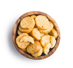 Sliced roasted bruschetta bread in bowl isolated on white background.