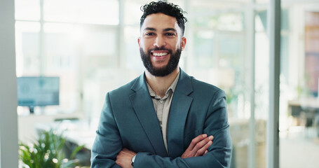 Arms crossed, portrait and smile of business man in office for corporate career development. Confident, face and pride with happy Indian employee person in workplace for start of company internship
