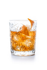 Old fashioned cocktail garnished with orange isolated on white background