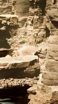 Beautiful Red River and shores of colored sandstone