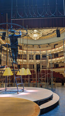 Theater stage workers constructing decorations for the performance