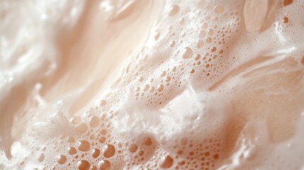 Fototapeta premium A macro photograph of the face wash's texture, focusing on the consistency and any ingredients, with the surrounding area softly blurred.