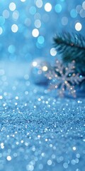 A blue background with a snowflake and a silver ornament