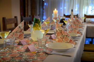 Long table with event decoration and name places