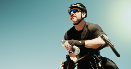 Water, thinking and cycling with man in city for triathlon mockup space, electrolytes and workout....