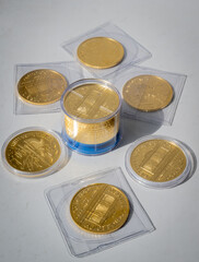 Photography close up of real golden coins on a black table and black background, photo of business, investors and market of gold growing up. with the collection of philharmonic of Austria.