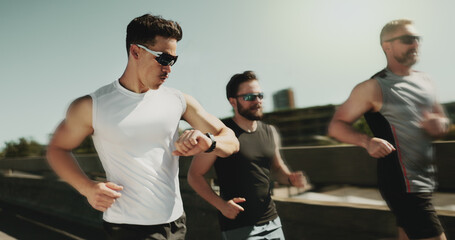 People, speed and running in city with watch, fitness tracker and check heart rate in urban town....