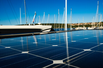 close up photography to solar panels in the roof of a yacht anchored in marina port in a sunny day. Stock photo