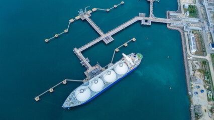 LNG (Liquified Natural Gas) tanker anchored in Gas terminal gas tanks for storage. Oil Crude Gas...