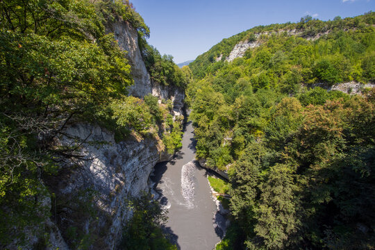 Argun Gorge, Chechen Republic (Chechnya), Russia. Top view of the Argun River flowing in a gorge among the rocks. Summer landscape with a mountain river. Natural landmark. Travel in the North Caucasus