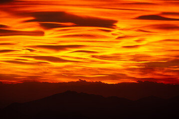 Lenticular clouds at sunset Amazing natural phenomena