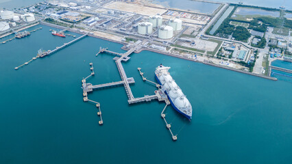 LNG (Liquified Natural Gas) tanker anchored in Gas terminal gas tanks for storage. Oil Crude Gas...
