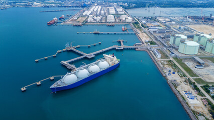 LNG (Liquified Natural Gas) tanker anchored in Gas terminal gas tanks for storage. Oil Crude Gas...