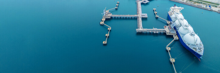 LNG (Liquified Natural Gas) tanker anchored in Gas terminal gas tanks for storage. Oil Crude Gas...
