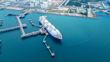 LNG (Liquified Natural Gas) tanker anchored in Gas terminal gas tanks for storage. Oil Crude Gas...