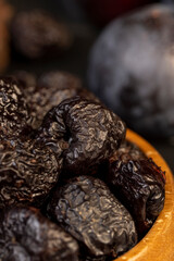 ripe purple plums and dried plums