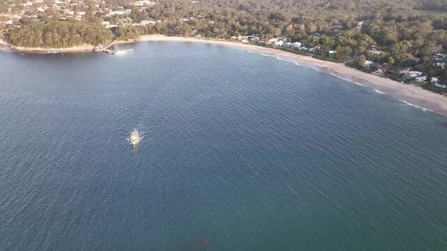 Simpsons Bay drone flight above the bay, boats and shoreline, Bundeena, Sydney, NSW Australia