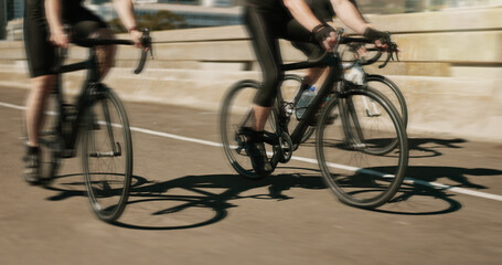 Race, people legs and bicycle in city for fast travel, exercise and cycling tour marathon. Athlete,...