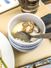 Chawanmushi , a Japanese egg custard dish that's savory and steamed in a cup