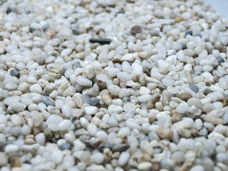 Small pearl pebbles. Stone background