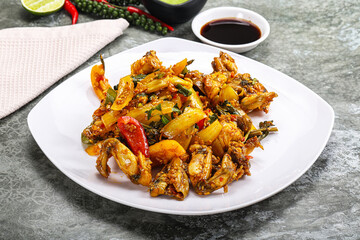 Vietnamese cuisine - fried frog with vegetables