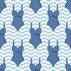 Obraz premium Blue women polka dot swimsuits on wavy background. Vector seamless pattern.