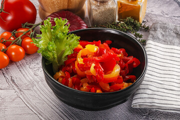 Diced raw bell red and yellow pepper