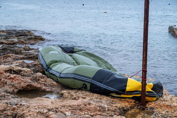 Broken water pontoon on the shore of the Mediterranean Sea