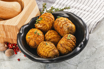 Baked baby potato with thyme