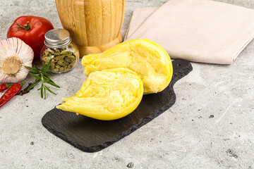 Italian traditional yellow Scamorza cheese