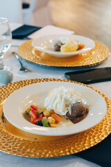 Dessert, Ice cream with whipped cream and fruit, sliced ​​fruit, golden plates, wedding dessert, plates with dessert, restaurant, whipped cream