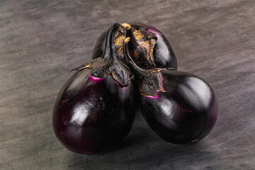 Raw violet and black eggplant
