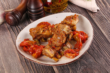 Baked lamb ribs with vegetables