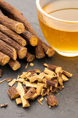 Hot drink made from dried liquorice stems in a cup - Glycyrrhiza glabra.