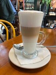 It's a glass of latte coffee.