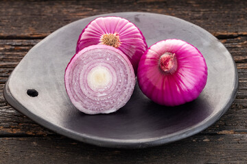 Allium cepa - Raw organic red onion.