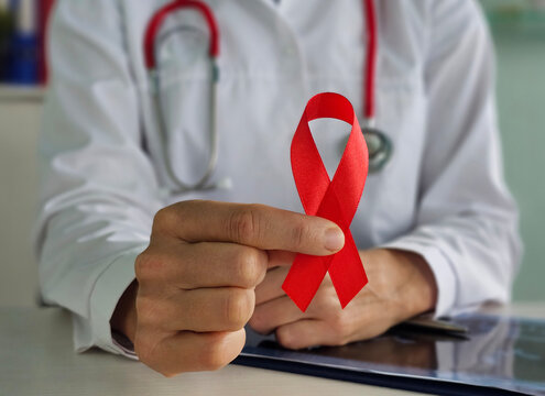 Red Ribbon for December World Aids Day, acquired immune deficiency syndrome