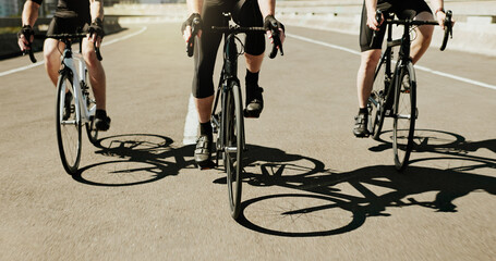 Fitness, people legs and bicycle in city for travel, exercise and cycling tour marathon. Men, bike...