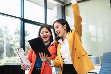 Portrait of a successful team businesswoman with inspiration from their excellent financial results front at the desk.