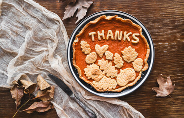 preparation process of Thanksgiving Pumpkin pie with autumn leaves decor