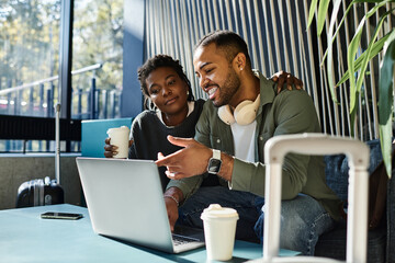 A couple discusses their travel plans while relaxing in the hotel lobby, enjoying each other's...