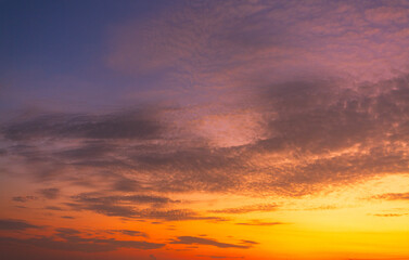 Orange sky and clouds background,Beautiful of luxury soft gradient orange gold clouds and sunlight on the blue sky perfect for the background, take in everning,Twilight