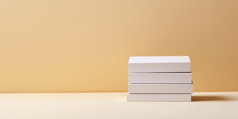 Fototapeta premium A series of stacked paper mockups displaying business card designs on a minimalist table